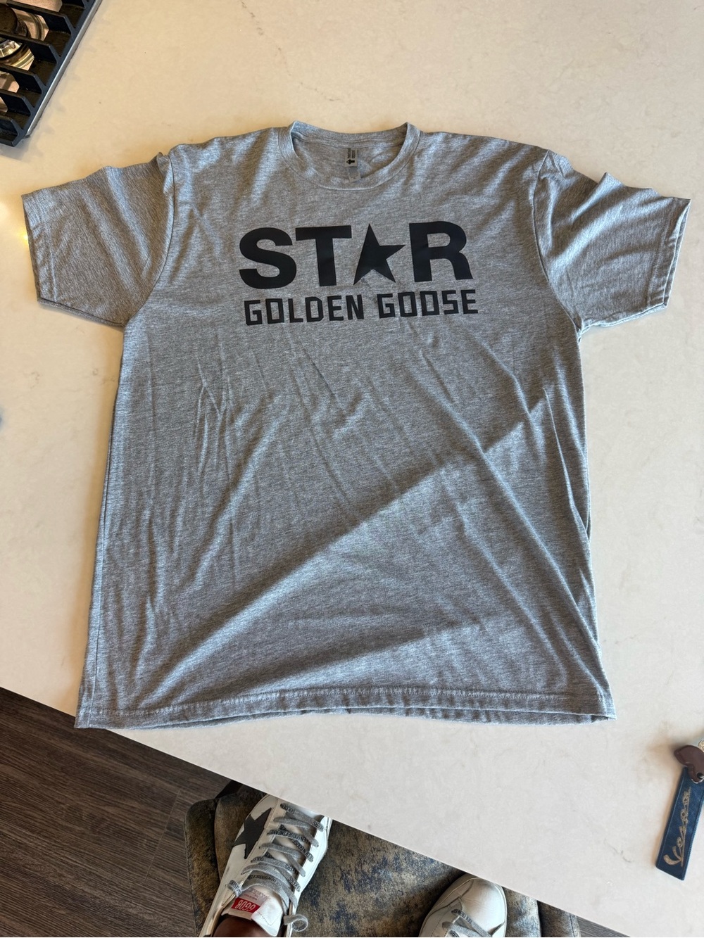 Next Level Apparel Gray Short-Sleeve Tee with Golden Goose Branding